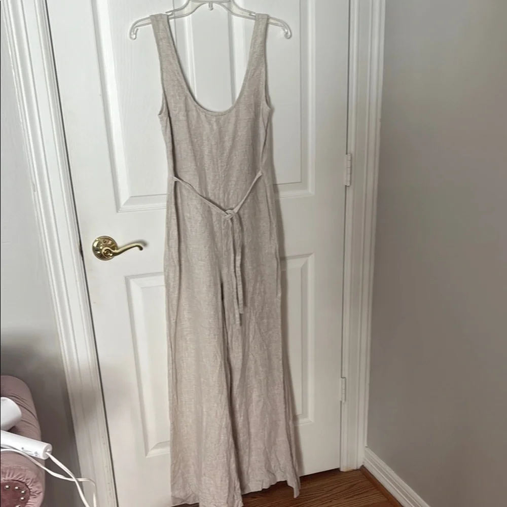 NWOT Reformation tan jumpsuit size small fits oversized
